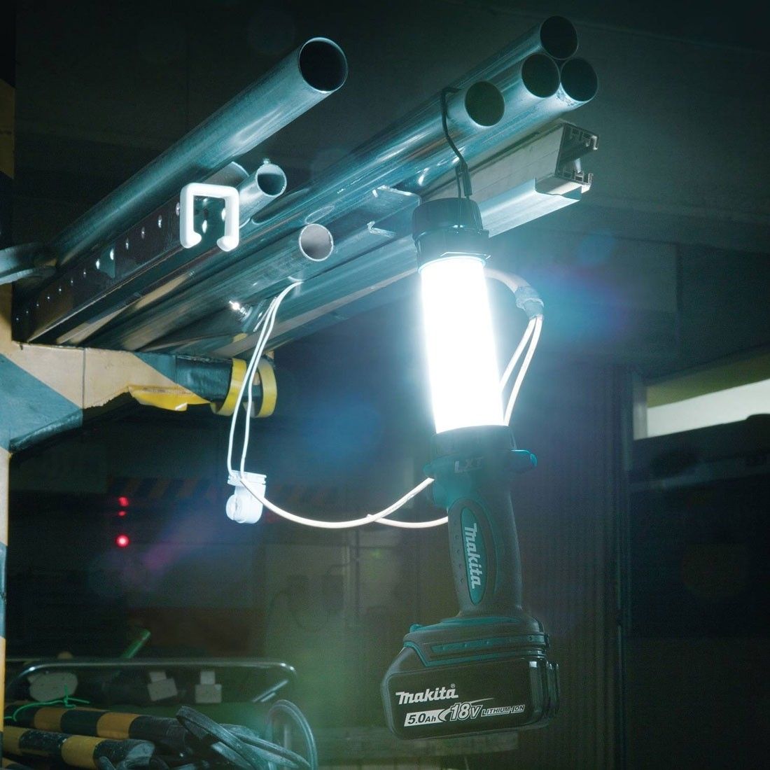 MAKITA DML806 hanging on a pole