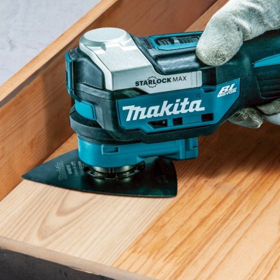 18v Brushless LXT Multi Tool on wooden surface